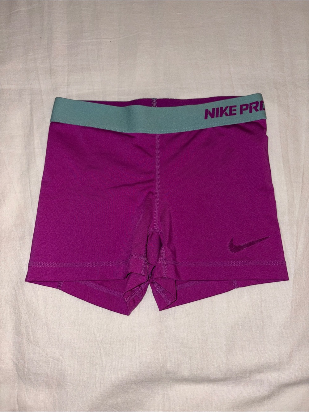 Nike Pro Women's Magenta Athletic Compression Shorts with Teal Waistband